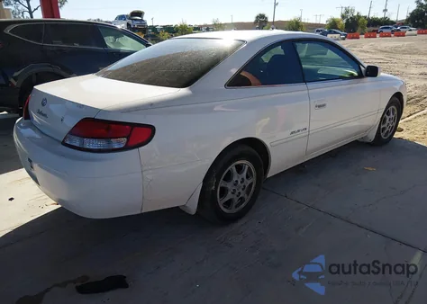 1999 Toyota Camry Solara Sle z USA, uszkodzony, nr VIN 2T1CF22P1XC150796